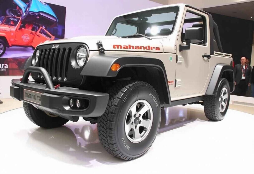 Mahindra Thar AX3L variant in action, demonstrating its off-road capabilities on rugged terrain.